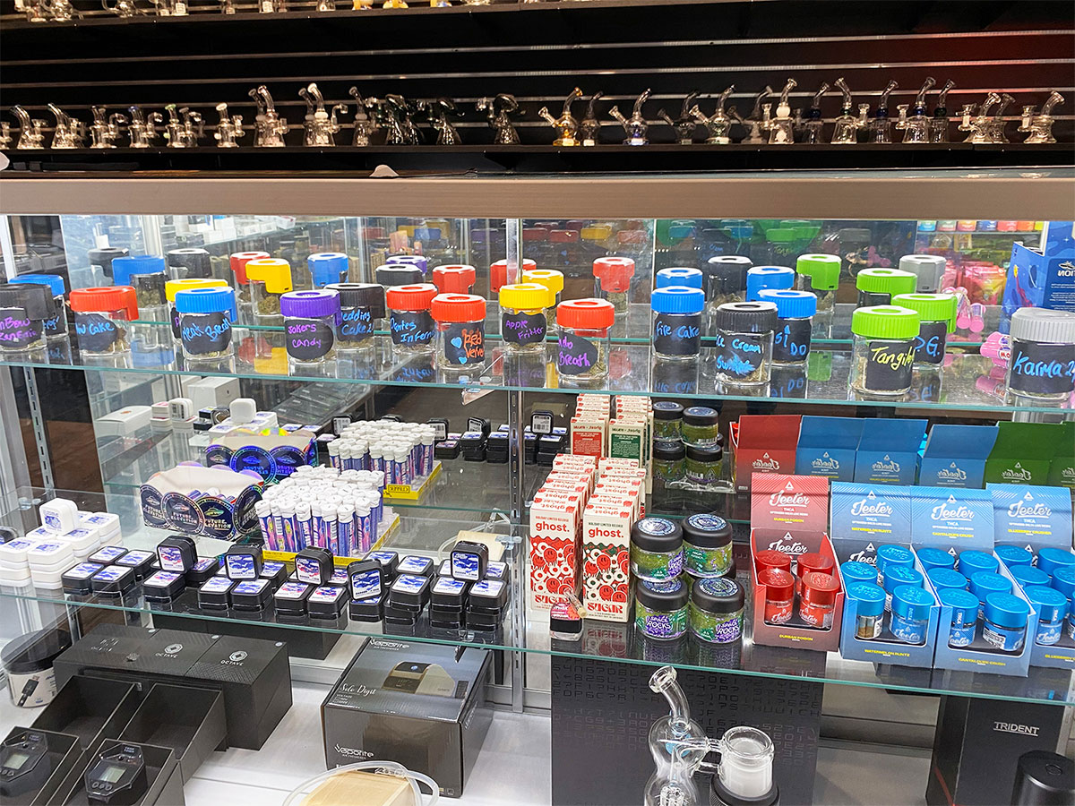 A product display of smoking accessories, THCa flower, concentrates and more at our smoke shop near Bloomingdale, New Jersey.