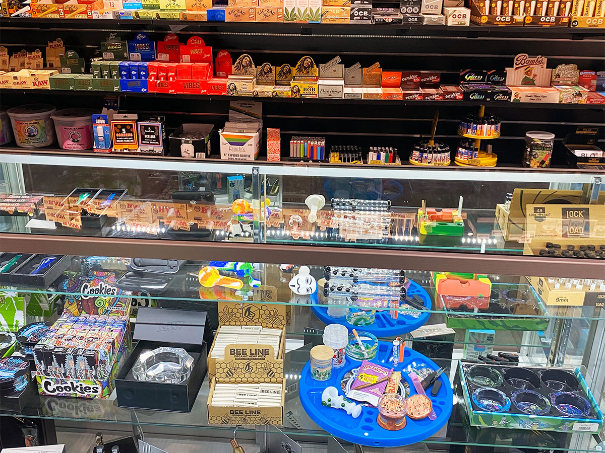 A product display of pipes, lighters, rolling papers, and other smoking accessory products at our Four Corners, Newark head shop and tobacco store.